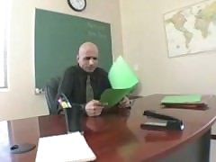 The sexy redhead schoolgirl has her face fucked by a lucky teacher